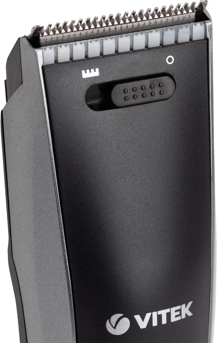Машинка для стрижки Vitek VT-2588 черный/серый [длина 1-30 мм, смена насадок и регулировка, насадок-2 шт, от аккумулятора, от сети, нерж.сталь]